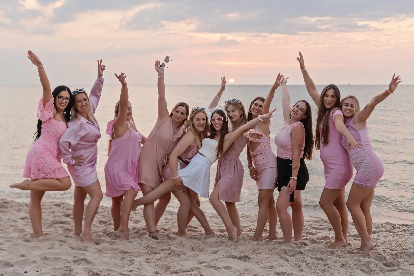 Friends celebrating during a hen party photoshoot in Kołobrzeg